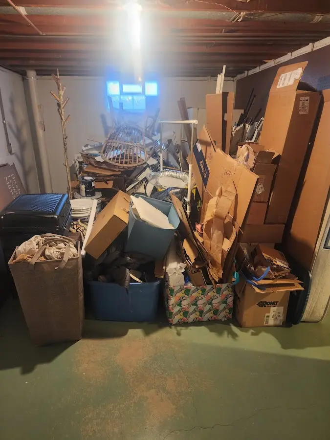 Roll-off dumpster container at job site for 2 Yard Dumpster Rental in Cheektowaga